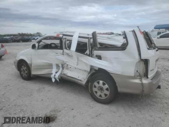 2003 Kia Sedona LX with VIN KNDUP131836430383, listed as a Copart auction lot 79829254 with 198,896 mi miles and Salvage Title. Bid and sale history available at carsss.com. Image 2.