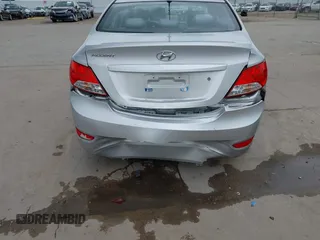 2013 Hyundai Accent GLS with VIN KMHCT4AE2DU469283, listed as a IAAI auction lot 41894969 with 231,072 mi miles and . Bid and sale history available at carsss.com. Image 6.