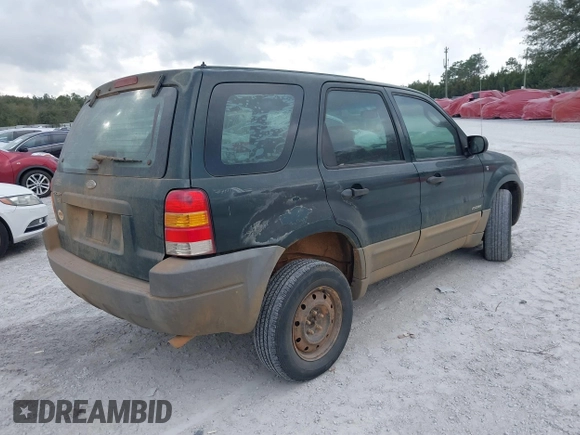2002 Ford Escape with VIN 1FMCU02132KD51298, listed as a IAAI auction lot 41550132 with 218,830 mi miles and . Bid and sale history available at DreamBid. Image 4.