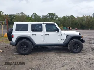2021 Jeep Wrangler Unlimited Willys with VIN 1C4HJXDN0MW685716, listed as a IAAI auction lot 40837088 with 35,881 mi miles and . Bid and sale history available at DreamBid. Image 13.