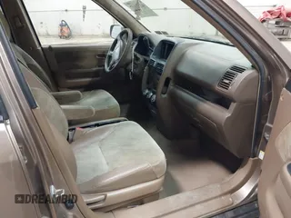 2004 Honda CR-V EX with VIN JHLRD78814C057877, listed as a IAAI auction lot 42065687 with 220,207 mi miles and . Bid and sale history available at carsss.com. Image 5.