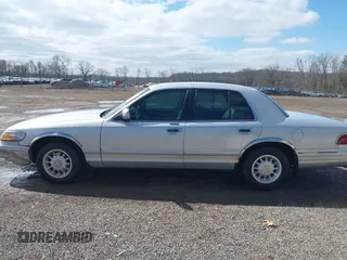 1997 Mercury Grand Marquis LS with VIN 2MELM75W3VX717801, listed as a IAAI auction lot 41920075 with 173,730 mi miles and . Bid and sale history available at DreamBid. Image 14.