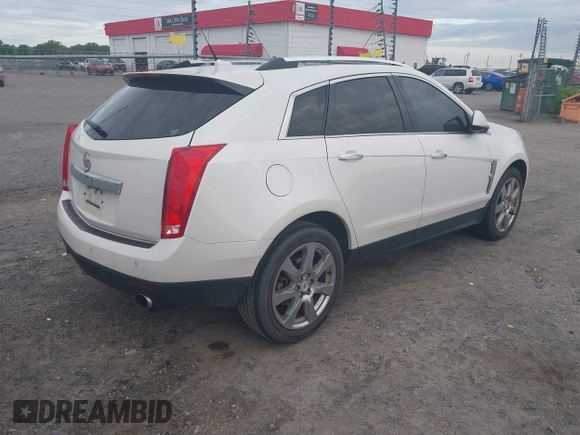 2011 Cadillac SRX Performance Collection with VIN 3GYFNBEY7BS585753, listed as a IAAI auction lot 42114525 with 233,329 mi miles and . Bid and sale history available at carsss.com. Image 4.