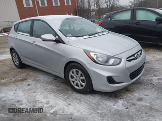 2013 Hyundai Accent GS with VIN KMHCT5AEXDU121818, listed as a IAAI auction lot 41490820 with 124,299 mi miles and . Bid and sale history available at DreamBid. Image 1.