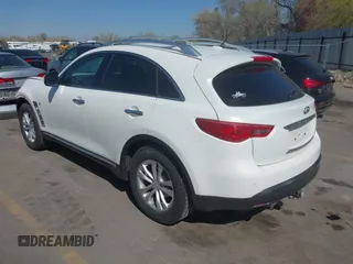 2014 Infiniti QX70 with VIN JN8CS1MW7EM413033, listed as a IAAI auction lot 41993136 with 148,838 mi miles and . Bid and sale history available at DreamBid. Image 3.