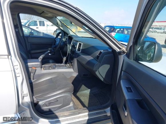 2010 Jeep Grand Cherokee Laredo with VIN 1J4PS4GK2AC155683, listed as a IAAI auction lot 41411133 with 211,803 mi miles. Bid and sale history available at carsss.com. Image 5.