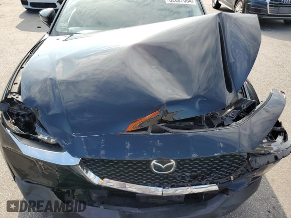 2020 Mazda CX-30 with VIN 3MVDMBBL9LM104107, listed as a Copart auction lot 62007684 with 52,753 mi miles and Salvage Title. Bid and sale history available at DreamBid. Image 12.