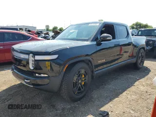 2024 Rivian R1T Adventure z VIN 7FCTGAAA3RN033543, wystawiony jako Copart lot #65133364 z przebiegiem Nie podano mil oraz Szkoda całkowita • Salvage title. Historia ofert i sprzedaży dostępna na DreamBid. Obrazek 1.