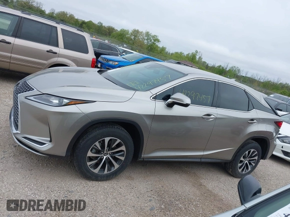 2022 Lexus RX 350 with VIN 2T2AZMDA7NC352957, listed as a IAAI auction lot 42297457 with 34,576 mi miles and . Bid and sale history available at DreamBid. Image 14.