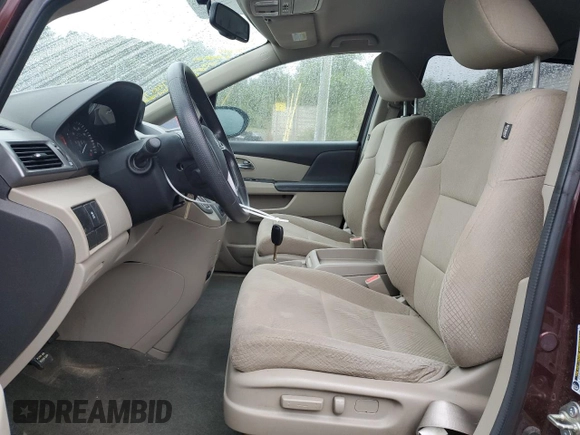 2014 Honda Odyssey LX z VIN 5FNRL5H24EB098072, wystawiony jako Copart lot #57577385 z przebiegiem 215 069 mil mil oraz Szkoda całkowita • Salvage title. Historia ofert i sprzedaży dostępna na DreamBid. Obrazek 7.