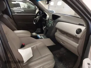 2011 Honda Pilot EX-L with VIN 5FNYF4H55BB039079, listed as a IAAI auction lot 42029278 with 173,216 mi miles. Bid and sale history available at carsss.com. Image 5.