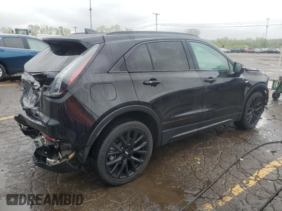 2022 Cadillac XT4 AWD Sport с VIN 1GYFZFR46NF170841, выставлен на аукционе Copart как лот 55863705 с пробегом 14 745 миль миль и Списание • Salvage title. История ставок и продаж доступна на DreamBid. Изображение 3.
