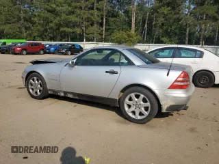 1999 Mercedes-Benz SLK-Class with VIN WDBKK47F9XF127582, listed as a Copart auction lot 71345494 with 187,302 mi miles and Salvage Title. Bid and sale history available at carsss.com. Image 2.