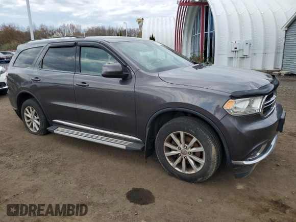 2015 Dodge Durango SXT with VIN 1C4RDJAG5FC908318, listed as a Copart auction lot 54559545 with 136,801 mi miles and Clean Title. Bid and sale history available at carsss.com. Image 4.