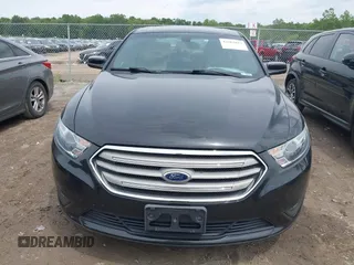 2015 Ford Taurus SEL with VIN 1FAHP2E80FG192017, listed as a IAAI auction lot 42562853 with 124,348 mi miles and . Bid and sale history available at DreamBid. Image 12.