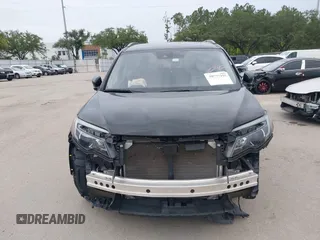 2021 Honda Pilot Special Edition with VIN 5FNYF5H27MB043732, listed as a IAAI auction lot 39777255 with 56,087 mi miles and . Bid and sale history available at DreamBid. Image 12.