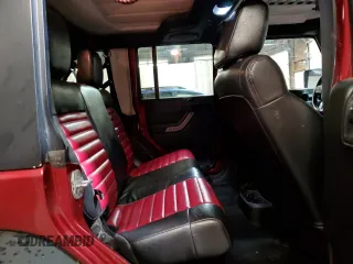 2012 Jeep Wrangler Unlimited Sport z VIN 1C4BJWDG8CL282181, wystawiony jako Copart lot #53863375 z przebiegiem 92 984 mil mil oraz Szkoda całkowita • Salvage title. Historia ofert i sprzedaży dostępna na DreamBid. Obrazek 11.