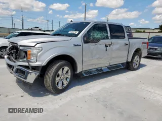 2019 Ford F-150 XL with VIN 1FTEW1E4XKKD25168, listed as a Copart auction lot 61694315 with 113,626 mi miles and Salvage title. Bid and sale history available at DreamBid. Image 1.
