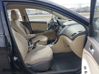 2013 Hyundai Accent GLS with VIN KMHCT4AE9DU584060, listed as a IAAI auction lot 41776202 with 287,477 mi miles. Bid and sale history available at carsss.com. Image 5.