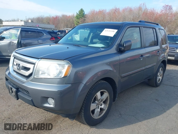 2011 Honda Pilot EX-L with VIN 5FNYF4H57BB107110, listed as a IAAI auction lot 42121356 with 300,169 mi miles and . Bid and sale history available at carsss.com. Image 17.