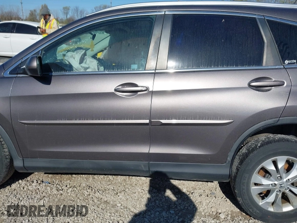 2012 Honda CR-V EX-L with VIN 5J6RM4H79CL014349, listed as a IAAI auction lot 42028523 with 118,571 mi miles. Bid and sale history available at carsss.com. Image 15.
