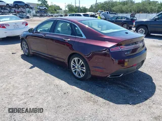 2013 Lincoln MKZ z VIN 3LN6L2GKXDR824996, wystawiony jako IAAI lot #42574204 z przebiegiem 81 370 mil mil oraz . Historia ofert i sprzedaży dostępna na DreamBid. Obrazek 3.