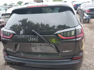 2020 Jeep Cherokee Latitude Plus with VIN 1C4PJMLBXLD580130, listed as a IAAI auction lot 42344240 with 82,814 mi miles and . Bid and sale history available at DreamBid. Image 20.