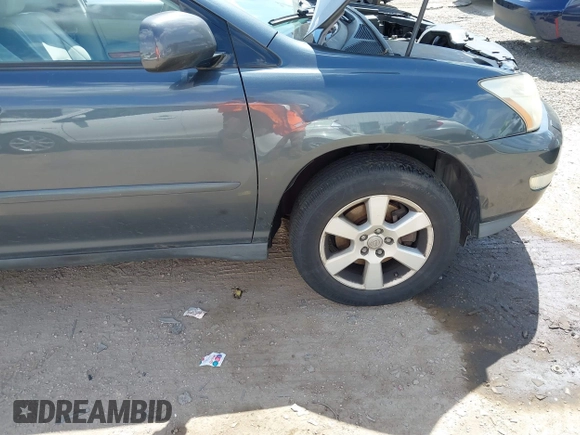 2005 Lexus RX 330 z VIN 2T2GA31U85C031830, wystawiony jako IAAI lot #42773281 z przebiegiem 188 859 mil mil oraz . Historia ofert i sprzedaży dostępna na DreamBid. Obrazek 16.