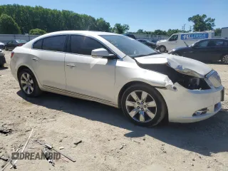 2012 Buick LaCrosse Premium 1 z VIN 1G4GD5E3XCF335041, wystawiony jako Copart lot #54889695 z przebiegiem 128 818 mil mil oraz Szkoda całkowita • Salvage title. Historia ofert i sprzedaży dostępna na DreamBid. Obrazek 4.