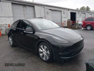 2022 Tesla Model Y Performance with VIN 7SAYGDEF7NF403701, listed as a IAAI auction lot 41961532 with 83,728 mi miles and . Bid and sale history available at DreamBid. Image 1.