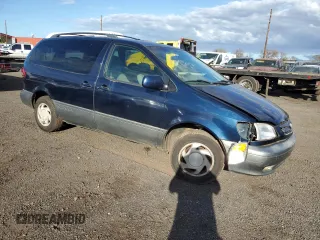 2001 Toyota Sienna LE z VIN 4T3ZF13C91U355926, wystawiony jako Copart lot #88992805 z przebiegiem 130 397 mil mil oraz Szkoda całkowita • Salvage title. Historia ofert i sprzedaży dostępna na DreamBid. Obrazek 4.