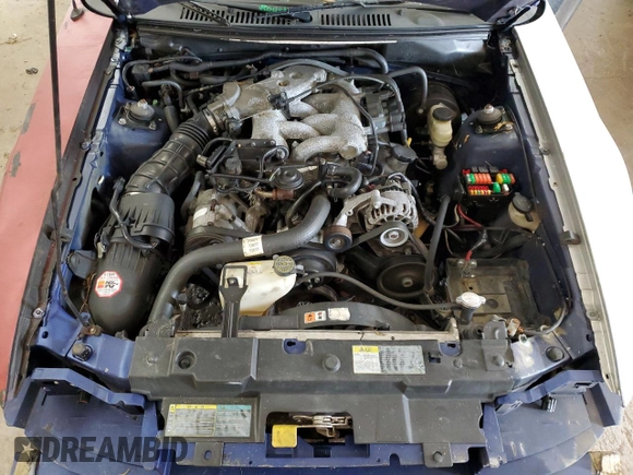 2004 Ford Mustang Deluxe with VIN 1FAFP44684F189081, listed as a Copart auction lot 59474985 with 249,812 mi miles and Salvage title. Bid and sale history available at DreamBid. Image 11.
