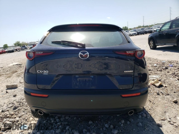 2023 Mazda CX-30 S with VIN 3MVDMBAM7PM520298, listed as a Copart auction lot 52251295 with 19,196 mi miles and Salvage Title. Bid and sale history available at carsss.com. Image 6.
