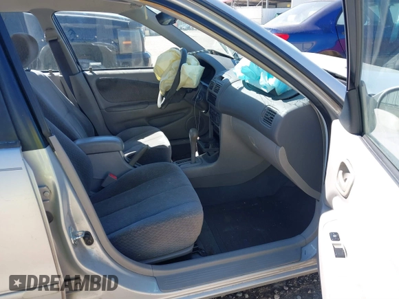 2002 Toyota Corolla CE with VIN 1NXBR12E92Z654340, listed as a IAAI auction lot 41805390 with 62,899 mi miles and . Bid and sale history available at DreamBid. Image 5.