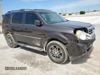 2013 Honda Pilot Touring with VIN 5FNYF3H90DB030323, listed as a Copart auction lot 57914985 with 226,792 mi miles and Salvage title. Bid and sale history available at DreamBid. Image 4.