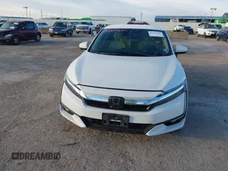2018 Honda Clarity z VIN JHMZC5F14JC002263, wystawiony jako IAAI lot #41353651 z przebiegiem 153 401 mil mil oraz . Historia ofert i sprzedaży dostępna na DreamBid. Obrazek 12.
