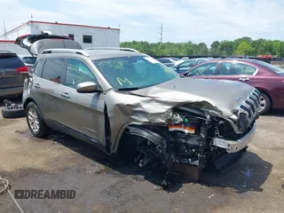 2016 Jeep Cherokee Latitude with VIN 1C4PJMCS3GW251912, listed as a IAAI auction lot 39753032 with 59,401 mi miles. Bid and sale history available at carsss.com. Image 1.