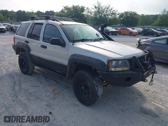 2003 Jeep Grand Cherokee Laredo z VIN 1J8GW48S33C519680, wystawiony jako IAAI lot #42126714 z przebiegiem 295 517 mil mil oraz . Historia ofert i sprzedaży dostępna na DreamBid. Obrazek 1.
