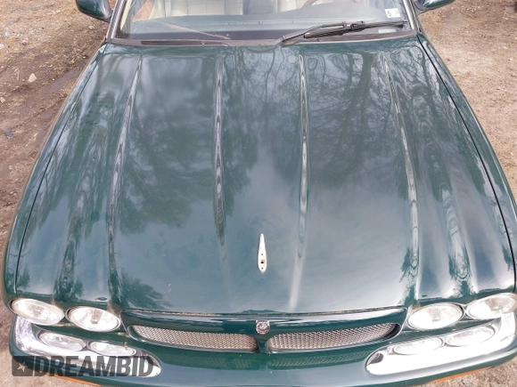 2003 Jaguar XJ with VIN SAJDA15B53MF53212, listed as a IAAI auction lot 41613266 with 180,165 mi miles and . Bid and sale history available at DreamBid. Image 10.