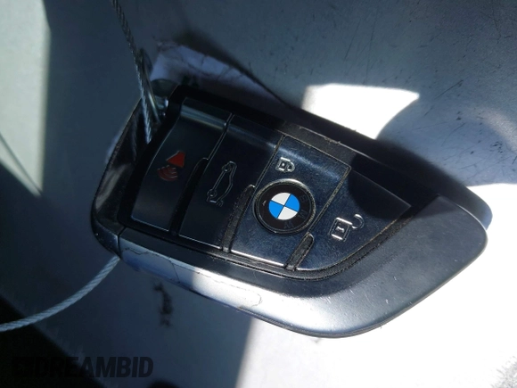 2016 BMW X5 xDrive50i with VIN 5UXKR6C51G0J81658, listed as a IAAI auction lot 41801382 with 34,572 mi miles. Bid and sale history available at carsss.com. Image 11.