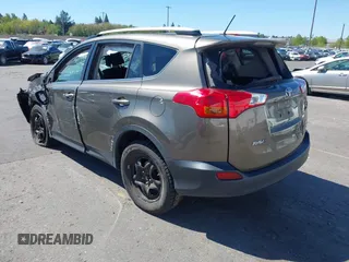 2015 Toyota RAV4 LE with VIN JTMBFREV2FD124756, listed as a IAAI auction lot 42051691 with 92,699 mi miles and . Bid and sale history available at DreamBid. Image 3.