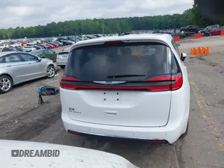 2023 Chrysler Pacifica Touring L with VIN 2C4RC1BG8PR535446, listed as a IAAI auction lot 42307923 with 65,718 mi miles and . Bid and sale history available at DreamBid. Image 16.
