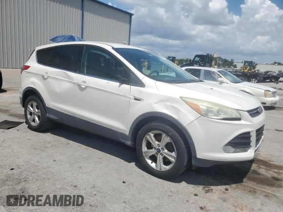 2013 Ford Escape SE z VIN 1FMCU0GX6DUD64499, wystawiony jako Copart lot #60971245 z przebiegiem 63 411 mil mil oraz Szkoda całkowita • Salvage title. Historia ofert i sprzedaży dostępna na DreamBid. Obrazek 4.