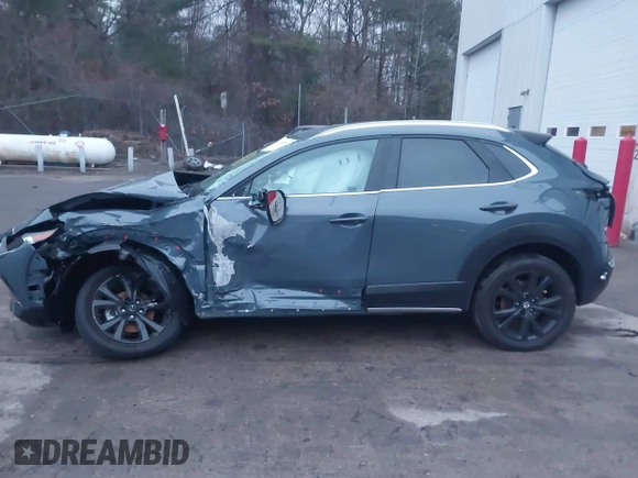 2023 Mazda CX-30 S Carbon Edition with VIN 3MVDMBCM5PM545150, listed as a IAAI auction lot 41104881 with 30,459 mi miles and . Bid and sale history available at DreamBid. Image 14.