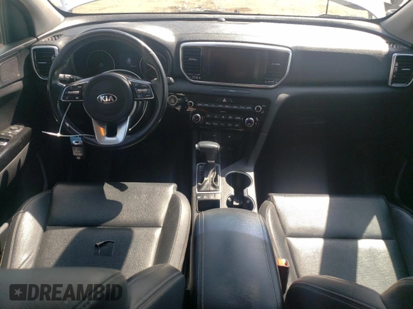 2020 Kia Sportage EX z VIN KNDPNCAC7L7705139, wystawiony jako Copart lot #52307635 z przebiegiem 125 755 mil mil oraz Szkoda całkowita • Salvage title. Historia ofert i sprzedaży dostępna na DreamBid. Obrazek 8.