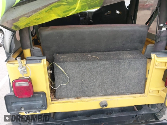2000 Jeep Wrangler SE with VIN 1J4FA29P5YP705215, listed as a IAAI auction lot 41920532 with 92,927 mi miles and . Bid and sale history available at DreamBid. Image 21.