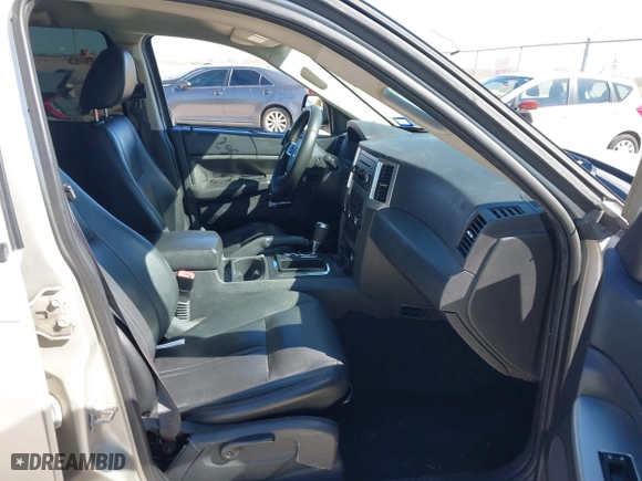 2010 Jeep Grand Cherokee Laredo with VIN 1J4PS4GK1AC111965, listed as a IAAI auction lot 41776362 with 209,042 mi miles. Bid and sale history available at carsss.com. Image 5.