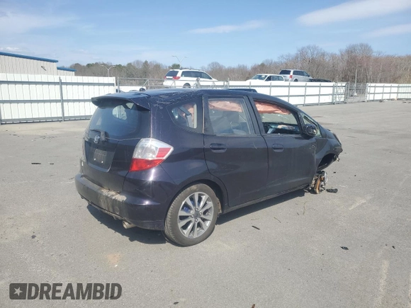 2013 Honda Fit Sport with VIN JHMGE8H57DC061007, listed as a Copart auction lot 52781015 with 176,667 mi miles and Clean Title. Bid and sale history available at carsss.com. Image 3.