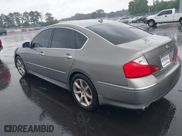 2010 Infiniti M with VIN JN1CY0APXAM910348, listed as a IAAI auction lot 42404010 with 216,965 mi miles and . Bid and sale history available at DreamBid. Image 3.