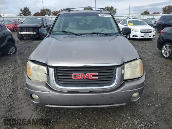 2005 GMC Envoy SLT with VIN 1GKDS13S852320018, listed as a Copart auction lot 80496544 with 237,451 mi miles and Salvage Title. Bid and sale history available at carsss.com. Image 5.